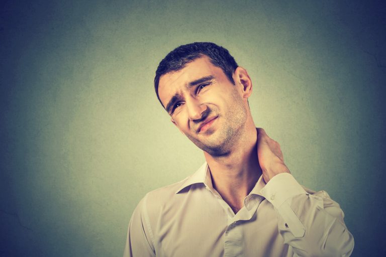 man having neck pain